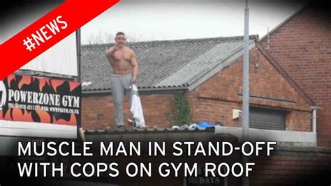 Watch Bare Chested Muscle Man Taunt Police From Gym Rooftop During