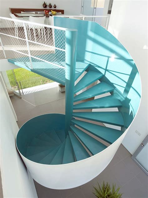 House With A Spiral Turquoise Staircase