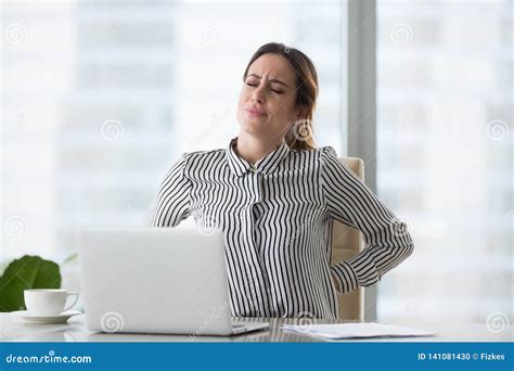 Tired Fatigued Woman Lying On Bed Having A Headache Royalty Free Stock