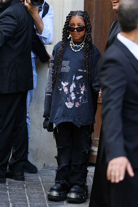 North West Goes Grunge In Distressed Jeans & Crocs for Balenciaga Show 