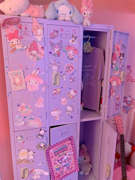 A Purple Toy Cabinet With Many Stickers On The Doors And Drawers In A