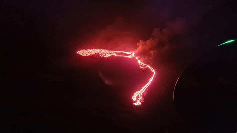Reykjaviks Night Sky Lights Up As Volcano In Fagradalsfjall Erupts