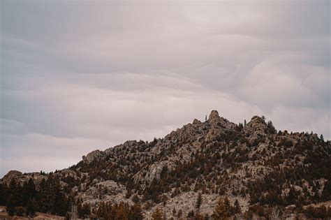 Gray Mountains Under Cloudy Sky · Free Stock Photo