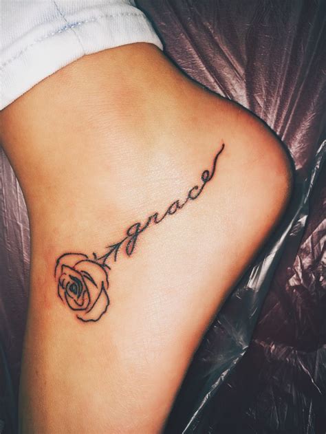 A very tiny small rose tattoo on wrist of girl. Rose Tattoo | Foot tattoos, Foot tattoos girls, Rose ...