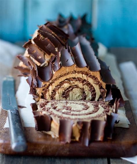 Rich chocolate genoise (sponge cake) is rolled in a coffee. The Most Beautiful Yule Log Cakes In The World | HuffPost