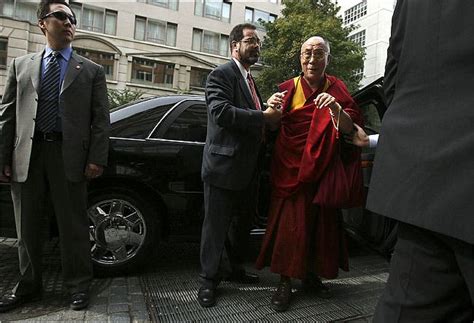 with one eye on china bush receives dalai lama the new york times