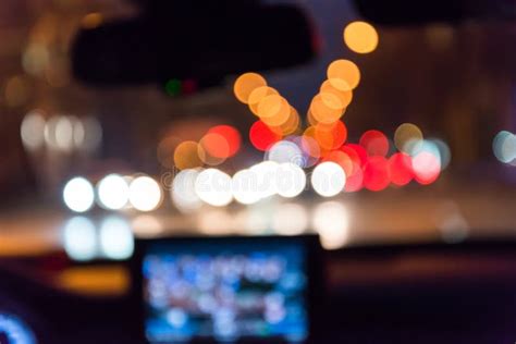 Blur Image From Inside Car With Bokeh Lights From Traffic Jam On Night