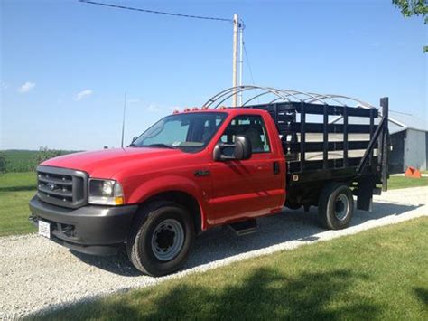 Find Used Ford F Super Duty Stake Bed Truck With Lb Lift Gate 1830