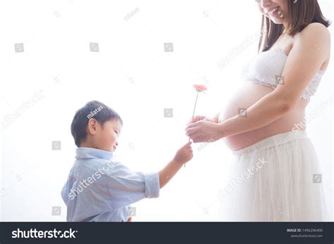 Pregnant Woman Playing Boy Flowers Stock Photo 1496296400 Shutterstock