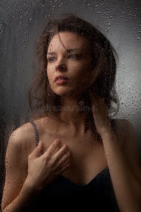 Portrait Of A Beautiful Girl Behind Wet Glass Stock Image Image Of Clothing Person