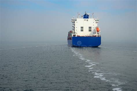 Blue Container Ship Cruising At Sea Stock Image Image Of Delivery