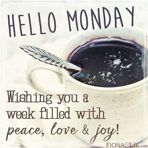 A Cup Of Coffee With A Spoon In It And The Words Hello Monday Wishing