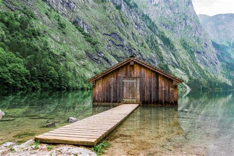 Mountain Lake Mountain Lake With Dock And Boat House Stock Photo