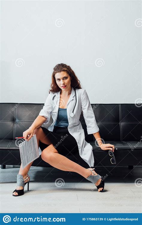 Nurse Sitting On Sofa And Stock Image Image Of Healthcare 175863139