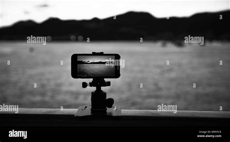 Smartphone Camera Filming A Coastline Landscape Time Lapse Stock Photo