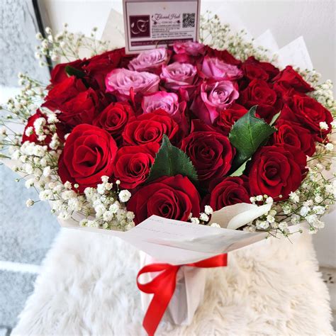 Casablanca Bouquet A Bouquet Arrangement Of Red And Purple Roses With