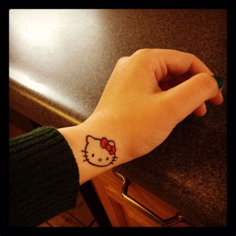 Pin By Amybeth White On Hello Kitty Tattoo Hello Kitty Tattoos