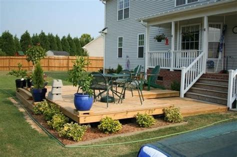 Armed with the right tools, creating a level site for your after leveling the ground, you need a truckload of sand. low-profile deck | Building a deck, Diy deck, Deck ...