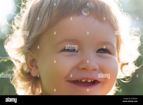 Portrait Of A Happy Laughing Child Close Up Positive Kids Cropped Face