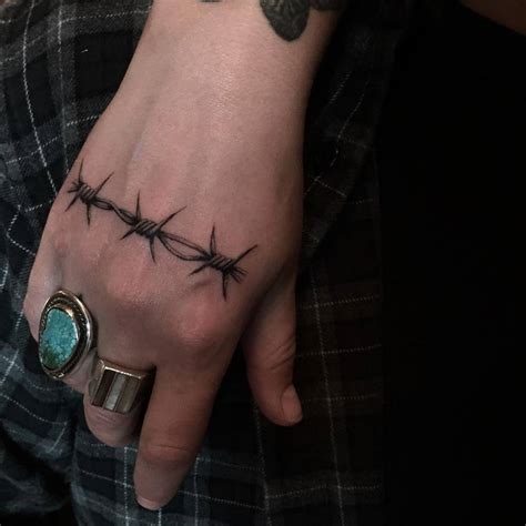 Barbed Wire Tattoo On The Right Hand
