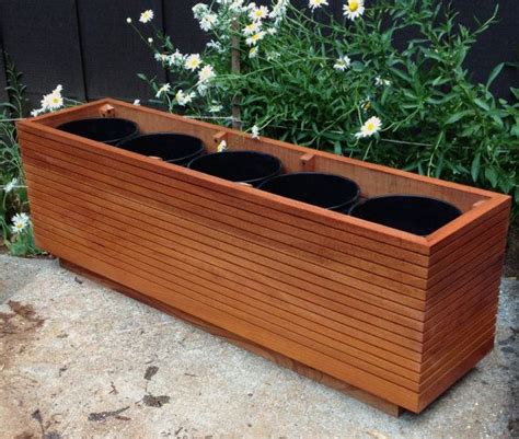 Shop our wide selection of 5 gallon buckets and pails. Tall Modern Mahogany Planter Boxes, Mid Century Modern ...
