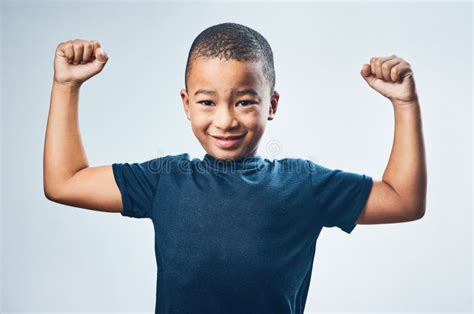 Boy Flexing His Muscles Stock Image Image Of Young Smiling 5123993