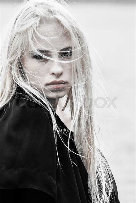 Close Up Portrait Of Beautiful Blonde Woman In Black Clothes Posing Outsidefull Lips Long Hair