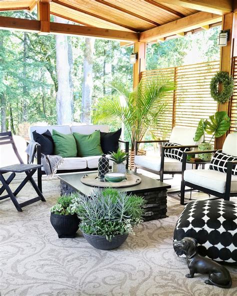 Maybe you would like to learn more about one of these? Cozy Black, White, & Green Outdoor Room filled with ...