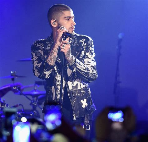 He's rocked everything from long and shaggy to short and tight, his hairtype. Zayn Malik in Faith Connexion Leather Jacket At Album ...