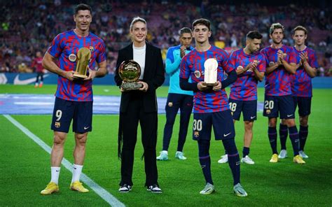 Alexia Lewandowski And Gavi Show Off Their Awards At The Spotify Camp Nou