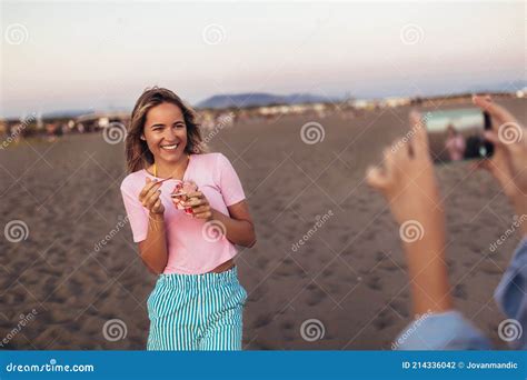 Girl Eating Ice Cream On The Beach Stock Photo Image Of Happiness