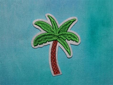 Download Aesthetic Teal Coconut Tree Embroidered Patch Wallpaper