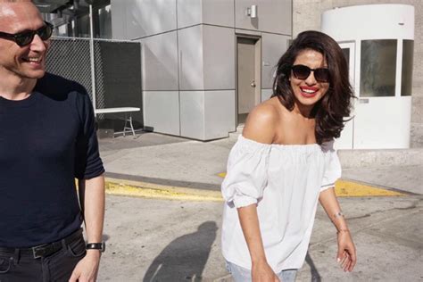 Priyanka Chopra Looks Stunning In Red As She Presents At Emmys With Tom Hiddleston