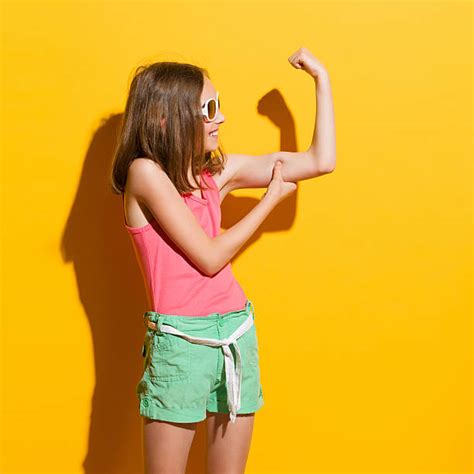 Girl Flexing Stock Photos Pictures And Royalty Free Images Istock