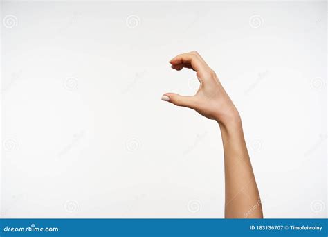 Side View Of Raised Young Woman S Hand Gesturing Something With Fingers