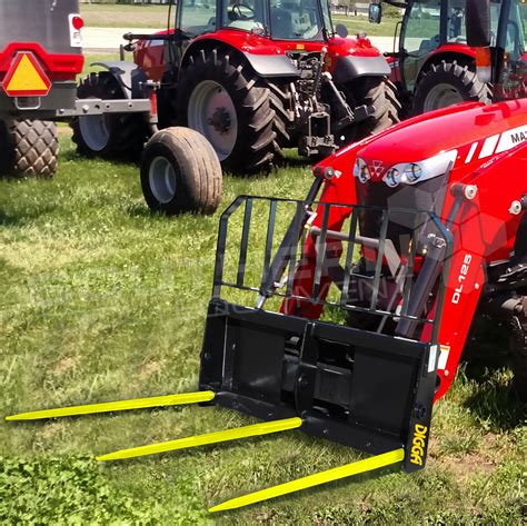 John Deere Garden Tractor With Loader Hay Forks For A Front End Loader