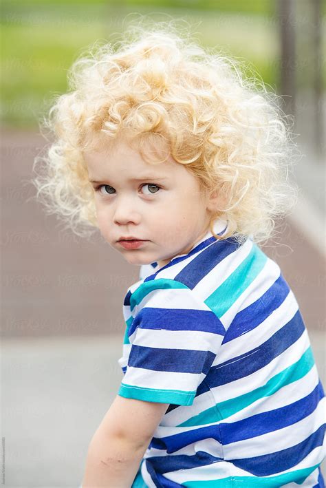 A Cute And Curly Blond Boy By Stocksy Contributor Andreas Gradin
