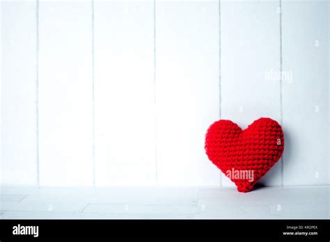 Single Red Heart In White Room Background Stock Photo Alamy