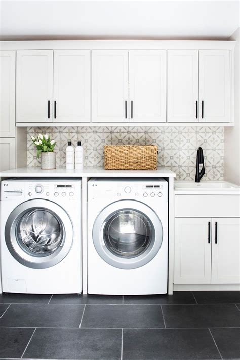 White Laundry Room Cabinets Well Organized And Bright Rooms Backsplash