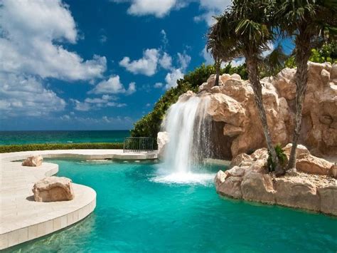 Great Tropical Swimming Pool With Pathway And Fountain Pool Waterfall