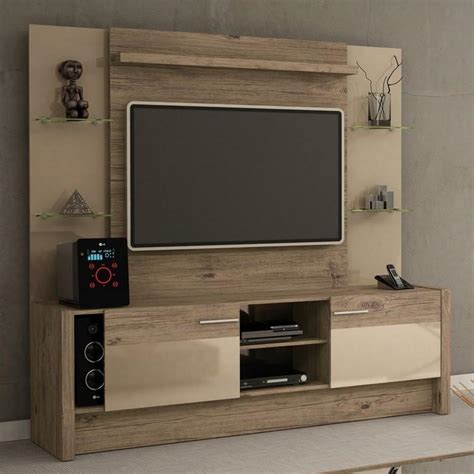 These floating shelves lend a sleek and elegant look. Modern Tv Cabinet Designs For Hall - CondoInteriorDesign.com