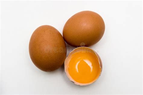 Three Eggs One Broken Egg Top View Egg Yolk Isolated On White