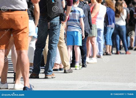Long Queue Of People Waiting In Line Stock Image Image Of Patient