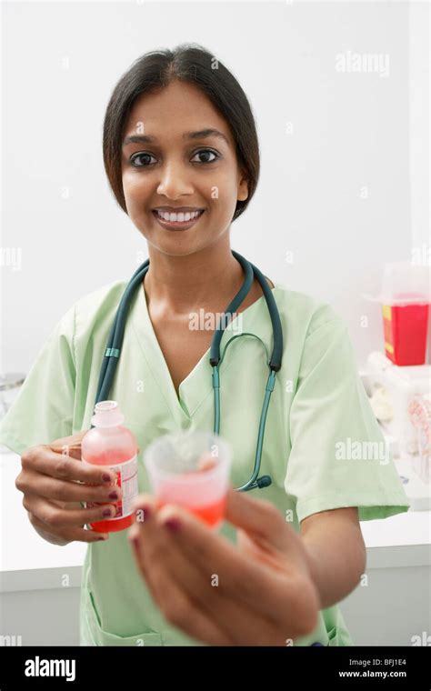 Doctor Giving Medicine Stock Photo Alamy