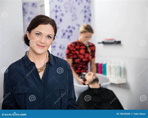 Portrait Of Beautiful Hairstylist In Salon Stock Photo Image Of