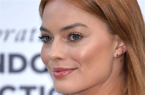 Margot Robbie Debuts Flame Red Hair At Charity Event In London