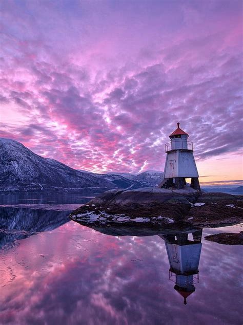 Purple Lighthouse With Sky Sunset Reflection In Water Purple