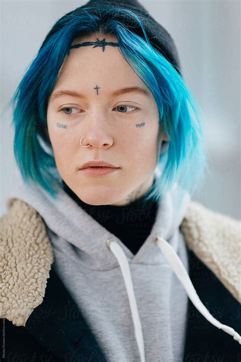 Young Woman With Tattoo On Her Face By Stocksy Contributor Alexey