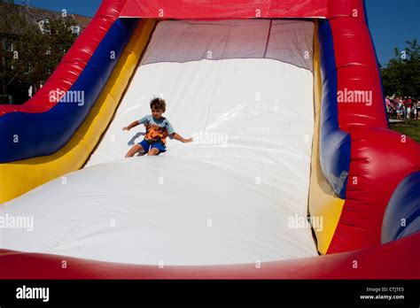 Child Sliding Inflatable Slide Stock Photo Alamy