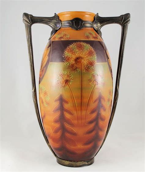 A Very Decorative Art Nouveau Ceramics Vase With A Metal Frame From The